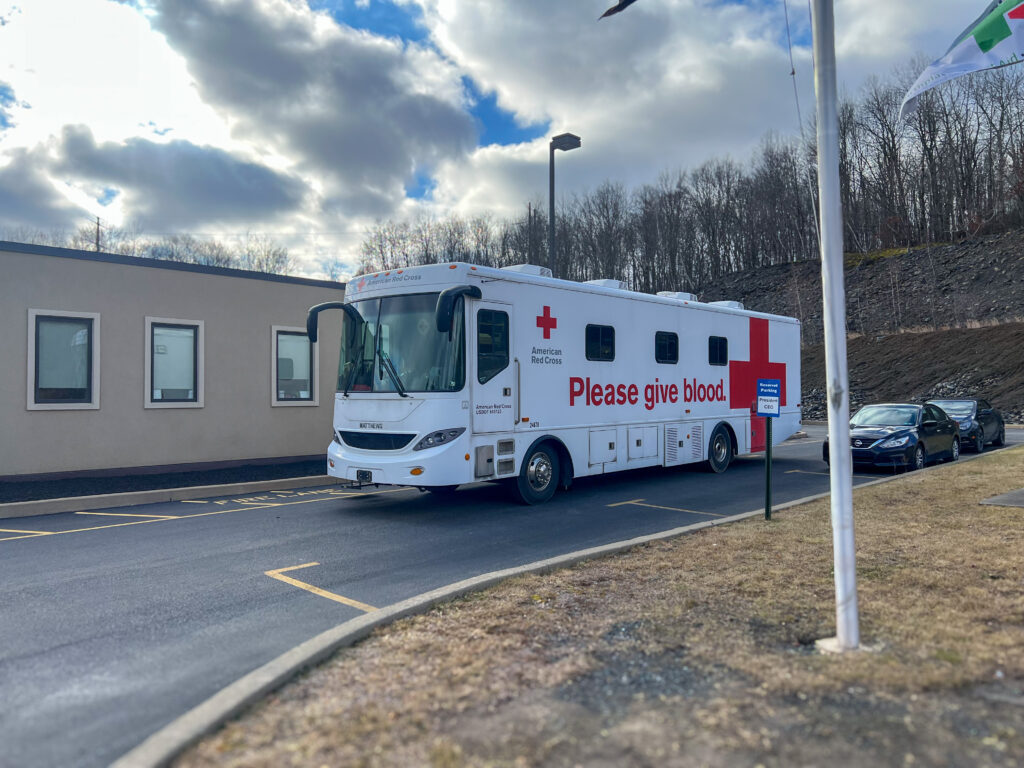 The American Red Cross bus parked outside The Wright Center for Community Health Mid Valley location