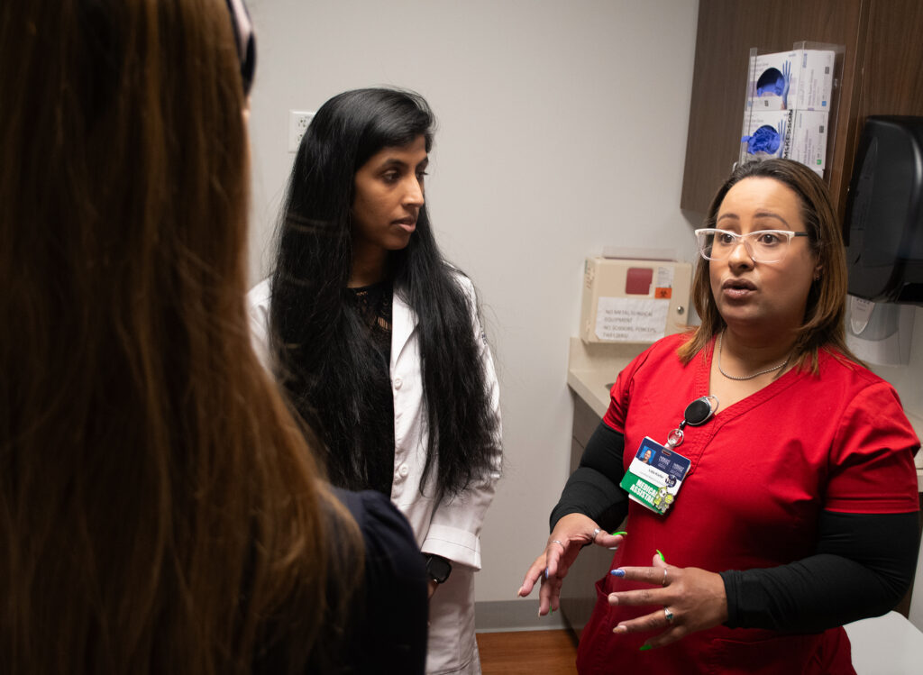 At The Wright Center for Community Health Scranton Practice, Lida Kiefer, right, interprets conversations between clinicians such as Dr. Nirali Patel and patients with limited English proficiency, allowing the patients to better understand and advocate for their own care. The Honesdale resident is a certified medical assistant II.