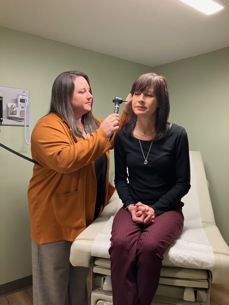 Maura Longstreet, left, with patient Jennifer Roth